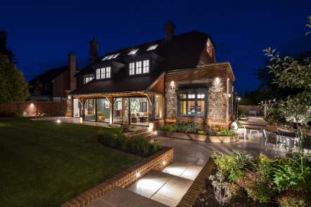 Exterior shot of house with lighting