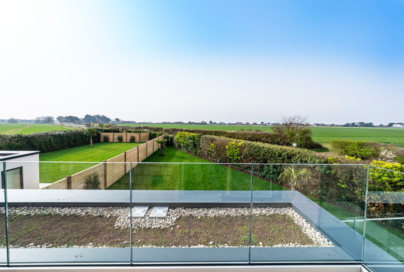 Side view of house in field