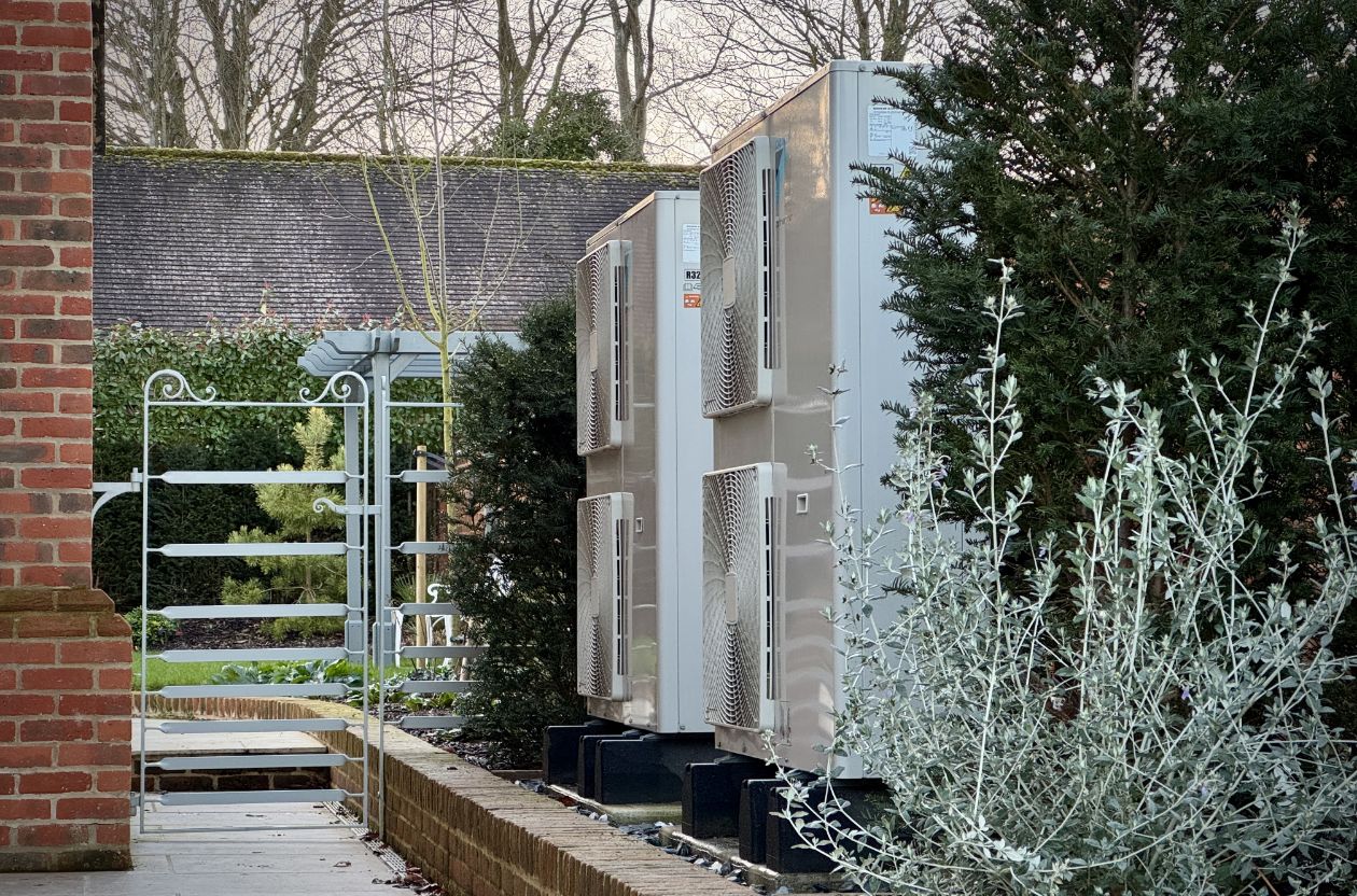 Image of heat pump on side of house